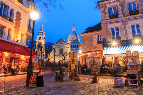 Beautiful evening view of the Place du Tertre and the Sacre-Coeur in Paris, France 