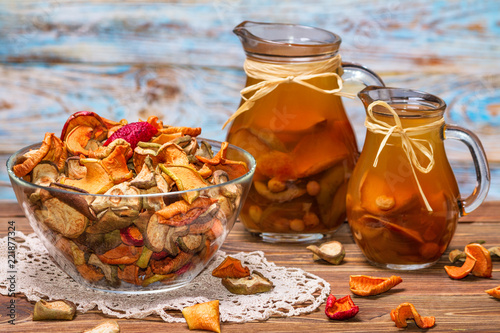 Rural still-life - compote with dried fruits from apples and pears close-up, selective focus