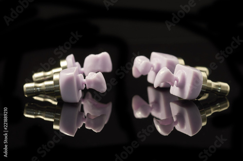 Four molars of lithium Disilicate glass-ceramic block for the CAD CAM technology.