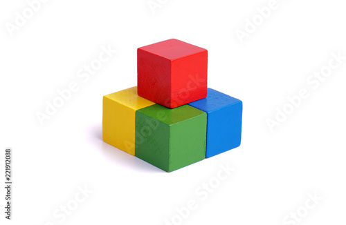 multi colored wooden block on white background