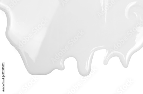 Spilled milk puddle isolated on white background and texture, top view