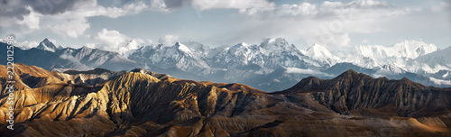 Panoramic view of snow mountains range landscape