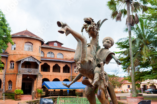 traditional bamileke bronze sculpture of horse in front of royal palace in batoufam in in west region of cameroun