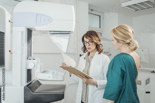 Doctor and Patient on Mammography Examination