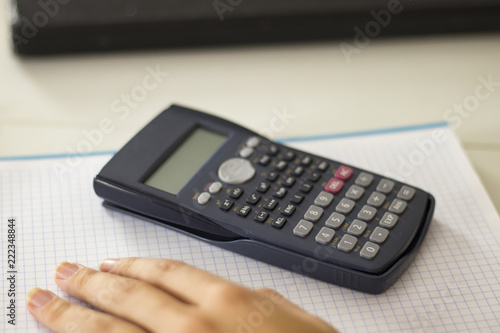 woman using calculator