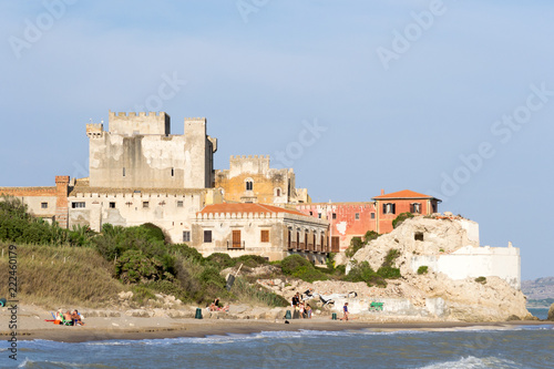 The beautiful castle of Falconara in Sicily seen from the sand beach. It was a sunny summer day in this nice hidden spot located near Butera, Caltanissetta.