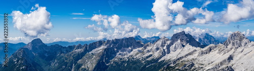 Panoramic view of the Julian Alps from the top of the Prisojnik mountain