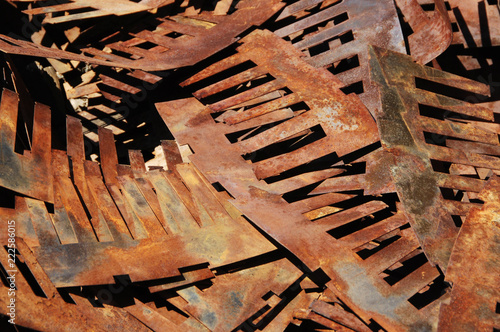 Pile of comb-like rusted metal