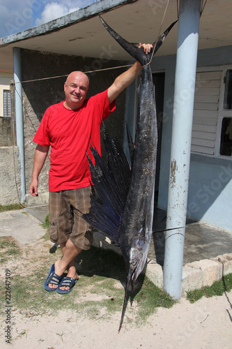 fishing for a sailfish (Istiophorus platypterus). Fisherman with sailfish (fish-sword). fishing in Cuba