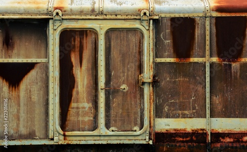 metal door of old and rusty bogie train