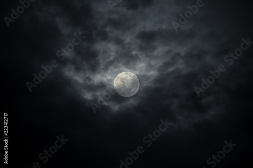 Cloudy full moon night