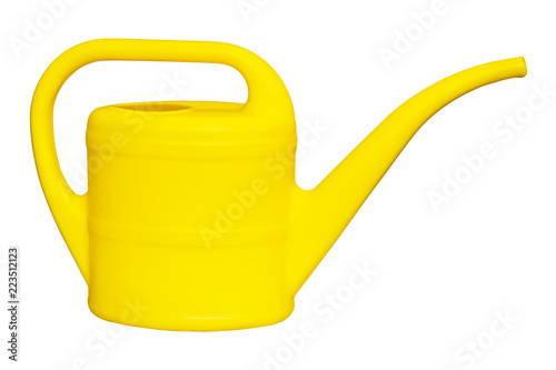 Yellow plastic watering can for watering plants isolated on white background close-up 