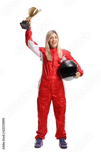 Female racer winner with a golden trophy cup