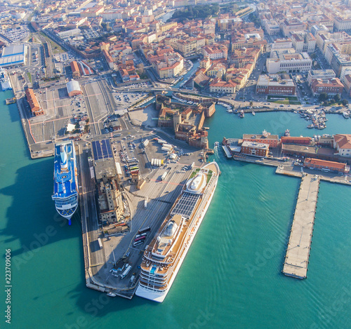 Large ocean liners are moored in the seaport of Livorno, Italy