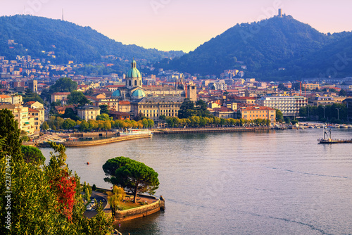 Como city town center on Lake Como, Italy, in warm sunset light