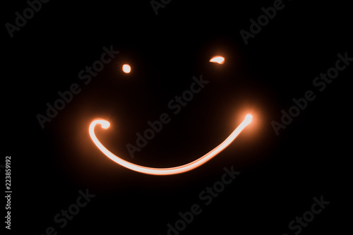 Light painting of a smile.