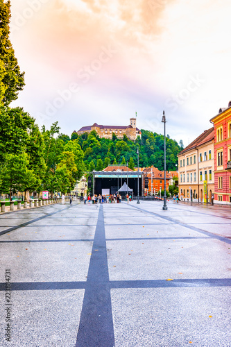 Ljubljana city street, look to castle on the hill. Tourism in the Slovenia capital.