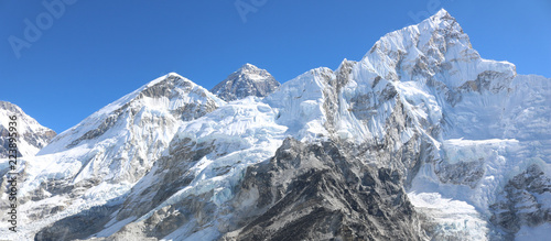 Amazing Shot Panoramic view of Nepalese Himalayas mountain peaks covered with white snow attract many climbers, some of them highly experienced mountaineers