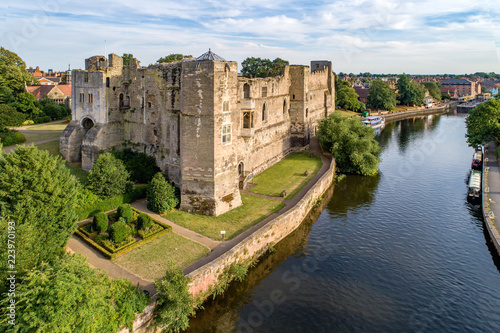 Medieval Gothic castle in Newark on Trent, near Nottingham, Nottinghamshire, England, UK. Aerial view with Trent River in sunset light