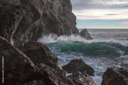 Waves crashing against the rocky shore