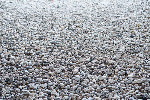 Perspective style, natural pebbles in dense shades of gray.