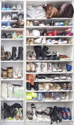 White shelves with shoes.