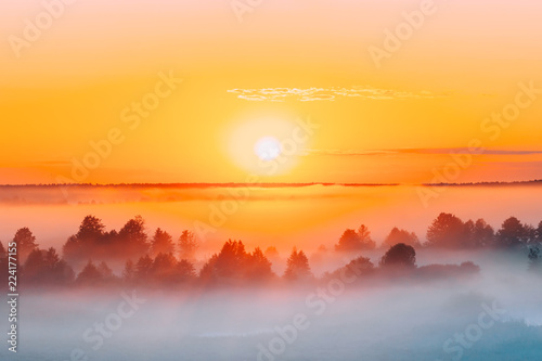 Sunrise Over Misty Landscape. Scenic View Of Foggy Morning Sky W