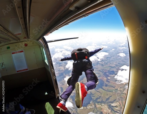 Skydiver jump out of plane