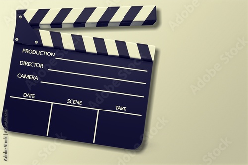 Movie clapper board on wooden background