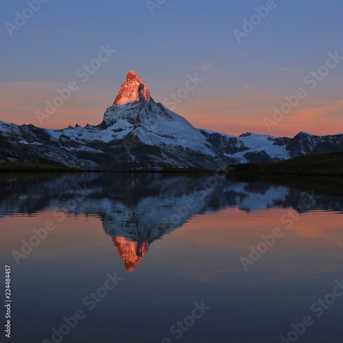 Matterhorn at sunrise reflecting in Lake Stelli, Zermatt. Switzerland.