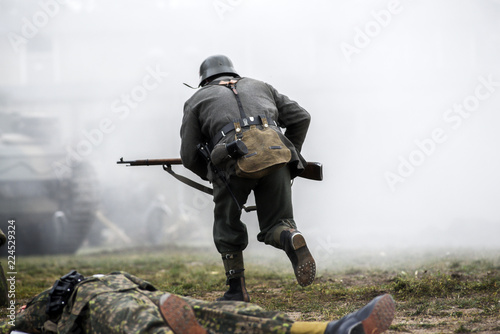 Historical reenactment of soldiers during the Second World War, view from the back