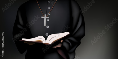 Un prêtre catholique en soutane tient la bible dans ses mains, pour prier Dieu.