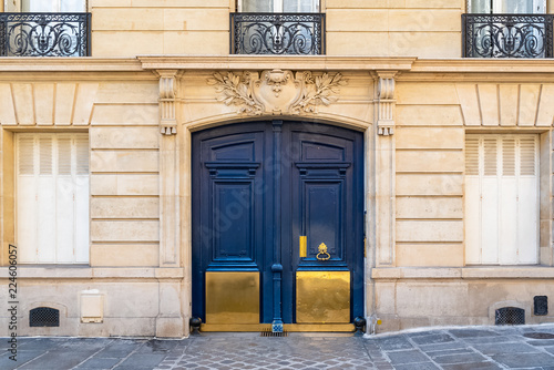 Paris, old wooden door boulevard des Batignolles, beautiful entry porch 