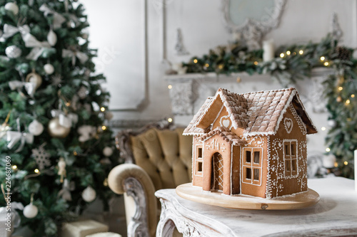 gingerbread house in living room. Christmas morning. Wonderful holiday mood