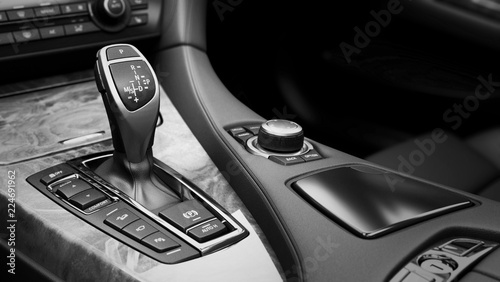 Detail of modern car interior gear stick automatic transmission in expensive car 3d render image