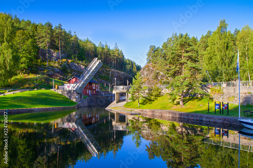 View of the Telemark Canal with old locks - tourist attraction in Skien, Norway
