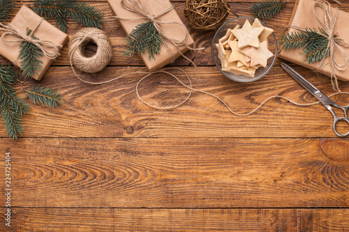 Craft Christmas presents on wooden table, copy space