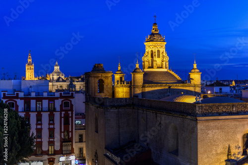 view of the roofs of Seville at night in Andalucia, Spain.