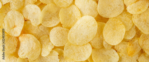 crispy potato chips snack texture background top view