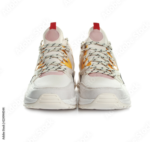 Pair of stylish sneakers on white background