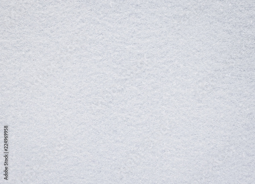 White felt texture. Blank fabric background. Detail of carpet material.