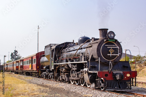 old steam locomotive in station
