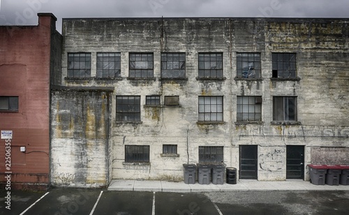 Old run down city buildings and parking lot