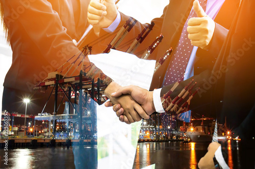 Business collaboration shake hands and abstract blur transportation import export background