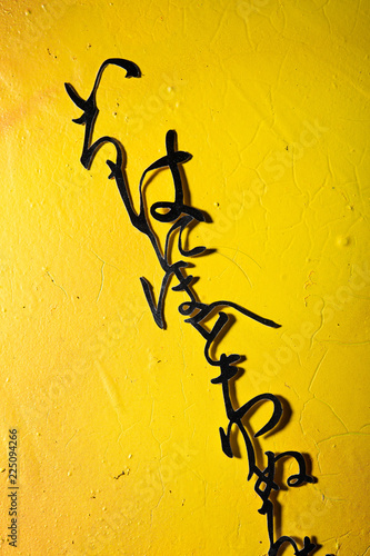 Cut Japanese A to Z characters on yellow grunge background