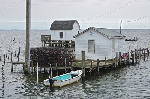 Shacks and crab traps on the coast of Tangier Island, Virginia, in the Chesapeake Bay. Since 1850 the island’s landmass has been reduced by 67%; the remaining landmass is expected to be lost by 2068.