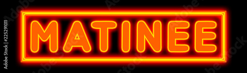 Matinee - glowing text on black background