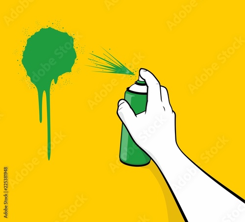 Man hand using green spray painting