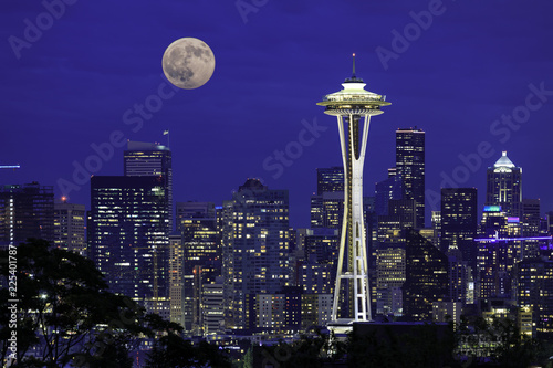 Full moon rising over the city of Seattle