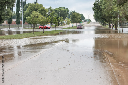 Stormwater flooding over the streets with stalled cars